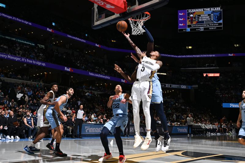 MEMPHIS, TN - NOVEMBER 29: Dejounte Murray #5 of the New Orleans Pelicans drives to the basket during the game against the Memphis Grizzlies during the Emirates NBA Cup game on November 29, 2024 at FedExForum in Memphis, Tennessee. NOTE TO USER: User expressly acknowledges and agrees that, by downloading and or using this photograph, User is consenting to the terms and conditions of the Getty Images License Agreement. Mandatory Copyright Notice: Copyright 2024 NBAE (Photo by Grant Burke/NBAE via Getty Images)