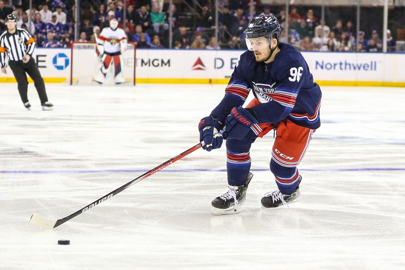 Mar 23, 2024; New York, New York, USA; New York Rangers center Jack Roslovic (96) chases the puck in the first period against the Florida Panthers at Madison Square Garden. Mandatory Credit: Wendell Cruz-USA TODAY Sports