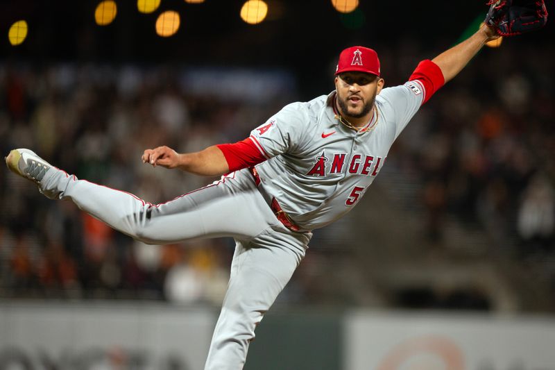 Jun 14, 2024; San Francisco, California, USA; Los Angeles Angels pitcher Carlos Estévez (53) delivers a pitch against the San Francisco Giants during the ninth inning at Oracle Park. Mandatory Credit: D. Ross Cameron-USA TODAY Sports