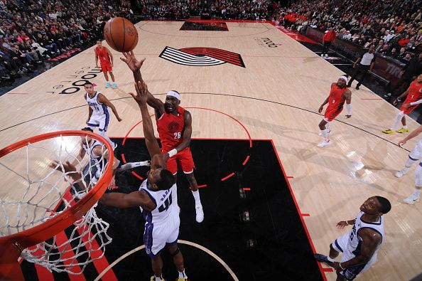 PORTLAND, OR - DECEMBER 26: Duop Reath #26 of the Portland Trail Blazers shoots the ball during the game against the Sacramento Kings on December 26, 2023 at the Moda Center Arena in Portland, Oregon. NOTE TO USER: User expressly acknowledges and agrees that, by downloading and or using this photograph, user is consenting to the terms and conditions of the Getty Images License Agreement. Mandatory Copyright Notice: Copyright 2023 NBAE (Photo by Cameron Browne/NBAE via Getty Images)