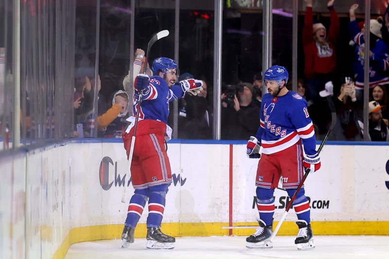 Dec 20, 2025; New York, New York, USA; New York Rangers center Mika Zibanejad (93) celebrates his game tying power play goal against the Philadelphia Flyers with center Vincent Trocheck (16) during the third period at Madison Square Garden. Mandatory Credit: Brad Penner-Imagn Images
