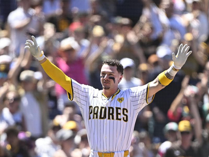 August 14, 2024; San Diego, California, USA; San Diego Padres outfielder Jackson Merrill (3) reacts after hitting an RBI triple against the Pittsburgh Pirates during the third inning at Petco Park. Mandatory Credit: Denis Poroy-USA TODAY Sports at Petco Park. 