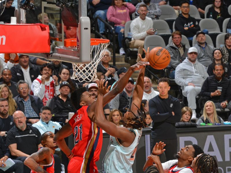 SAN ANTONIO, TX - DECEMBER 8: Yves Missi #21 of the New Orleans Pelicans blocks a shot during the game against the San Antonio Spurs on December 8, 2024 at the Frost Bank Center in San Antonio, Texas. NOTE TO USER: User expressly acknowledges and agrees that, by downloading and or using this photograph, user is consenting to the terms and conditions of the Getty Images License Agreement. Mandatory Copyright Notice: Copyright 2024 NBAE (Photos by Jesse D. Garrabrant/NBAE via Getty Images)