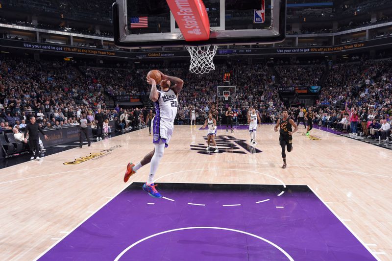 SACRAMENTO, CA - MARCH 19:  Markell Fultz #20 of the Sacramento Kings drives to the basket during the game against the Cleveland Cavaliers on March 19, 2025 at Golden 1 Center in Sacramento, California. NOTE TO USER: User expressly acknowledges and agrees that, by downloading and or using this Photograph, user is consenting to the terms and conditions of the Getty Images License Agreement. Mandatory Copyright Notice: Copyright 2025 NBAE (Photo by Rocky Widner/NBAE via Getty Images)