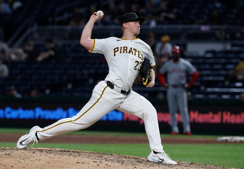 May 6, 2024; Pittsburgh, Pennsylvania, USA;  Pittsburgh Pirates starting pitcher Mitch Keller (23) pitches against the Los Angeles Angels during the ninth inning for a complete game at PNC Park. The Pirates won 4-1. Mandatory Credit: Charles LeClaire-USA TODAY Sports