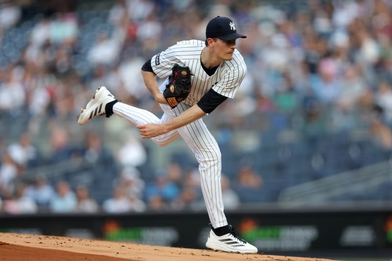 Jun 5, 2025; Bronx, New York, USA; New York Yankees starting pitcher Max Fried (54) follows through on a pitch against the Cleveland Guardians during the first inning at Yankee Stadium. Mandatory Credit: Brad Penner-Imagn Images