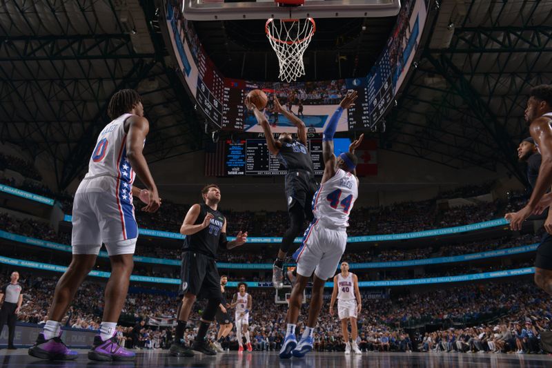 DALLAS, TX - MARCH 3: Derrick Jones Jr. #55 of the Dallas Mavericks shoots the ball during the game against the Philadelphia 76ers on March 3, 2024 at the American Airlines Center in Dallas, Texas. NOTE TO USER: User expressly acknowledges and agrees that, by downloading and or using this photograph, User is consenting to the terms and conditions of the Getty Images License Agreement. Mandatory Copyright Notice: Copyright 2024 NBAE (Photo by Glenn James/NBAE via Getty Images)