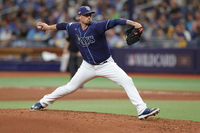 Oct 4, 2023; St. Petersburg, Florida, USA; Tampa Bay Rays relief pitcher Shawn Armstrong (64) pitches against the Texas Rangers in the seventh inning during game two of the Wildcard series for the 2023 MLB playoffs at Tropicana Field. Mandatory Credit: Nathan Ray Seebeck-USA TODAY Sports