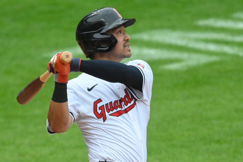 Jul 4, 2024; Cleveland, Ohio, USA; Cleveland Guardians left fielder Steven Kwan (38) hits a solo home run in the third inning against the Chicago White Sox at Progressive Field. Mandatory Credit: David Richard-USA TODAY Sports