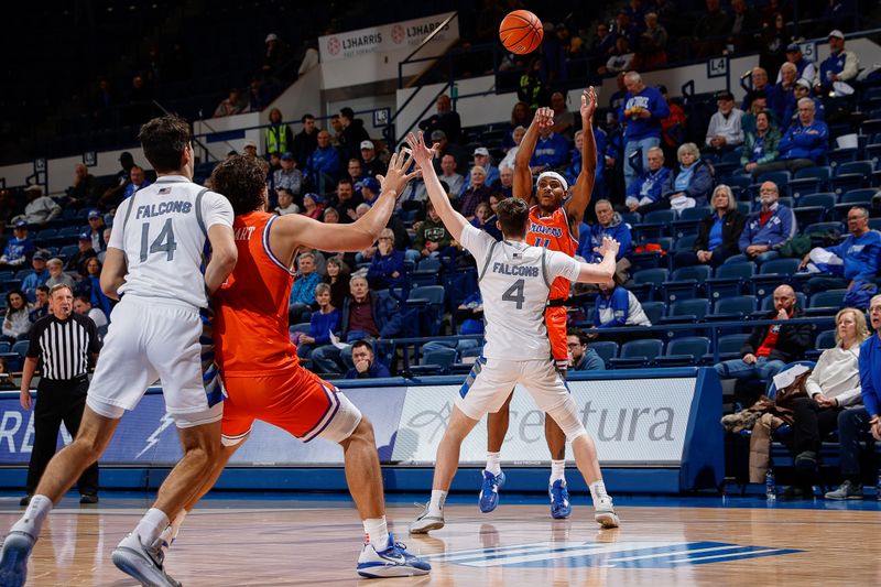 Jan 31, 2023; Colorado Springs, Colorado, USA; Boise State Broncos guard Chibuzo Agbo (11) passes the ball over Air Force Falcons guard Carter Murphy (4) to forward Tyson Degenhart (2) as forward Beau Becker (14) defends in the first half at Clune Arena. Mandatory Credit: Isaiah J. Downing-USA TODAY Sports