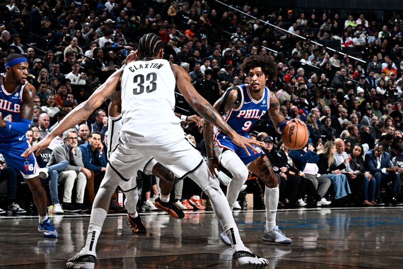 BROOKLYN, NY - MARCH 5: Kelly Oubre Jr. #9 of the Philadelphia 76ers dribbles the ball during the game against the Brooklyn Nets on March 5, 2024 at Barclays Center in Brooklyn, New York. NOTE TO USER: User expressly acknowledges and agrees that, by downloading and or using this Photograph, user is consenting to the terms and conditions of the Getty Images License Agreement. Mandatory Copyright Notice: Copyright 2024 NBAE (Photo by David Dow/NBAE via Getty Images)