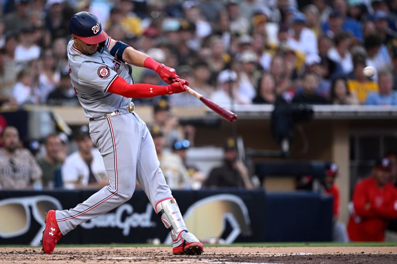 Jun 24, 2024; San Diego, California, USA; Washington Nationals first baseman Joey Meneses (45) hits an RBI double against the San Diego Padres during the third inning at Petco Park. Mandatory Credit: Orlando Ramirez-USA TODAY Sports