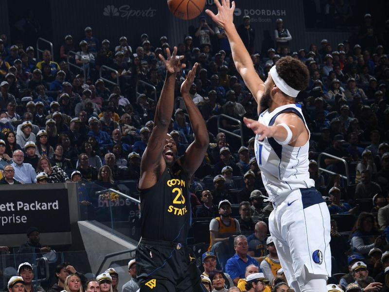 SAN FRANCISCO, CA - NOVEMBER 12: Draymond Green #23 of the Golden State Warriors shoots a three point basket during the game against the Dallas Mavericks during the Emirates NBA Cup game on November 12, 2024 at Chase Center in San Francisco, California. NOTE TO USER: User expressly acknowledges and agrees that, by downloading and or using this photograph, user is consenting to the terms and conditions of Getty Images License Agreement. Mandatory Copyright Notice: Copyright 2024 NBAE (Photo by Noah Graham/NBAE via Getty Images)