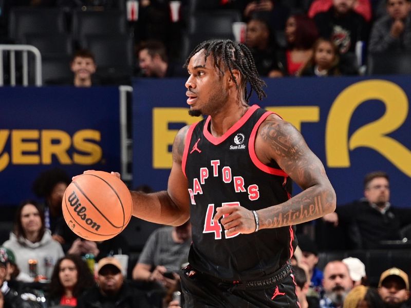 DETROIT, MI - NOVEMBER 24: Davion Mitchell #45 of the Toronto Raptors dribbles the ball during the game against the Detroit Pistons on November 24, 2024 at Little Caesars Arena in Detroit, Michigan. NOTE TO USER: User expressly acknowledges and agrees that, by downloading and/or using this photograph, User is consenting to the terms and conditions of the Getty Images License Agreement. Mandatory Copyright Notice: Copyright 2024 NBAE (Photo by Chris Schwegler/NBAE via Getty Images)