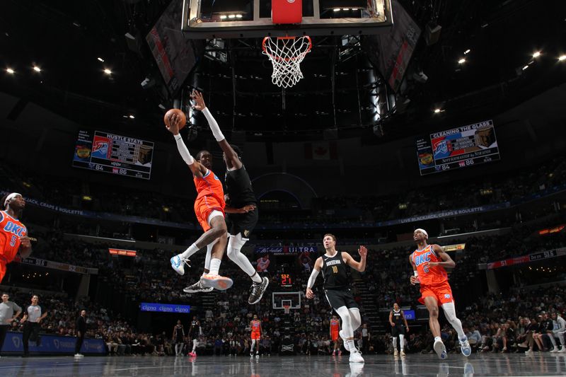 MEMPHIS, TN - MARCH 16: Jalen Williams #8 of the Oklahoma City Thunder drives to the basket during the game against the Memphis Grizzlies on March 16, 2024 at FedExForum in Memphis, Tennessee. NOTE TO USER: User expressly acknowledges and agrees that, by downloading and or using this photograph, User is consenting to the terms and conditions of the Getty Images License Agreement. Mandatory Copyright Notice: Copyright 2024 NBAE (Photo by Joe Murphy/NBAE via Getty Images)