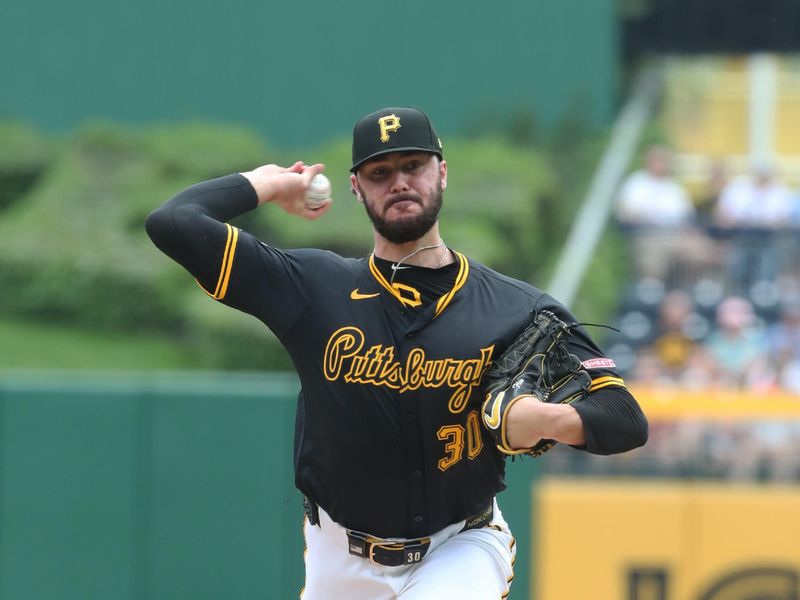 May 1, 2025; Pittsburgh, Pennsylvania, USA;  Pittsburgh Pirates starting pitcher Paul Skenes (30) delivers a pitch against the Chicago Cubs during the first inning at PNC Park. Mandatory Credit: Charles LeClaire-Imagn Imagesn