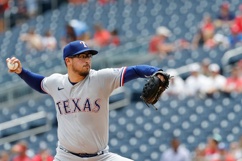 Jul 9, 2023; Washington, District of Columbia, USA; Texas Rangers starting pitcher Dane Dunning (33) pitches against the Washington Nationals during the third inning at Nationals Park. Mandatory Credit: Geoff Burke-USA TODAY Sports