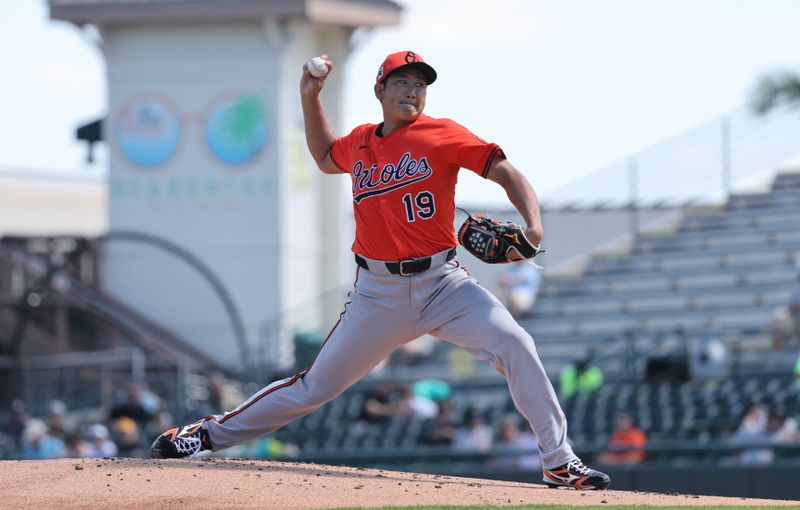 Feb 26, 2025; Bradenton, Florida, USA;  Baltimore Orioles pitcher Tomoyuki Sugano (19) throws a pitch against the Pittsburgh Pirates during the first inning at LECOM Park. Mandatory Credit: Kim Klement Neitzel-Imagn Images