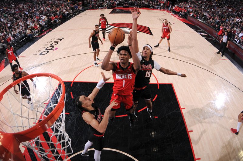 PORTLAND, OR - APRIL 12: Amen Thompson #1 of the Houston Rockets shoots the ball during the game against the Portland Trail Blazers on April 12, 2024 at the Moda Center Arena in Portland, Oregon. NOTE TO USER: User expressly acknowledges and agrees that, by downloading and or using this photograph, user is consenting to the terms and conditions of the Getty Images License Agreement. Mandatory Copyright Notice: Copyright 2024 NBAE (Photo by Cameron Browne/NBAE via Getty Images)