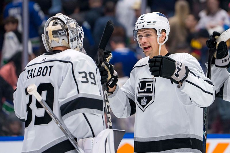 Mar 25, 2024; Vancouver, British Columbia, CAN; Los Angeles Kings goalie Cam Talbot (39) and defenseman Andreas Englund (5) celebrate their victory against the Vancouver Canucks at Rogers Arena. Kings won 3 -2. Mandatory Credit: Bob Frid-USA TODAY Sports