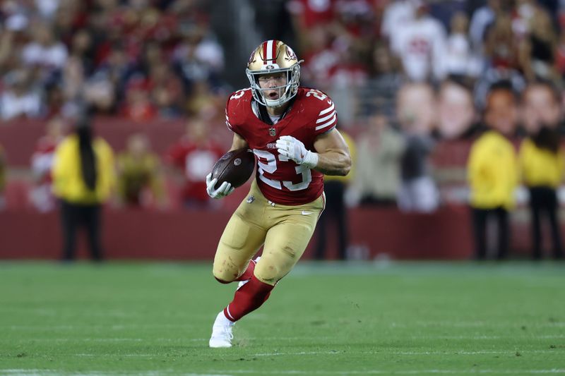 San Francisco 49ers running back Christian McCaffrey (23) runs against the Dallas Cowboys during the second half of an NFL football game in Santa Clara, Calif., Sunday, Oct. 8, 2023. (AP Photo/Jed Jacobsohn)