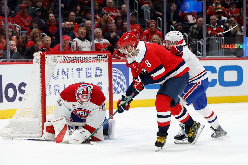 Jan 13, 2026; Washington, District of Columbia, USA; Montréal Canadiens goaltender Samuel Montembeault (35) makes a save on Washington Capitals left wing Alex Ovechkin (8) as Canadiens defenseman Lane Hutson (48) defends during the first period at Capital One Arena. Mandatory Credit: Geoff Burke-Imagn Images