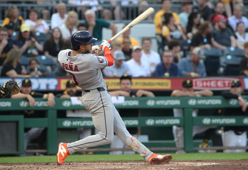 Jun 4, 2025; Pittsburgh, Pennsylvania, USA;  Houston Astros shortstop Jeremy Pena (3) hits a double against the Pittsburgh Pirates during the sixth inning at PNC Park. Mandatory Credit: Charles LeClaire-Imagn Images