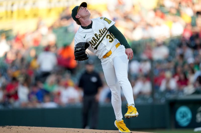 May 21, 2025; West Sacramento, California, USA; Athletics pitcher JP Sears (38) watches the ball after throwing a pitch against the Los Angeles Angels in the first inning at Sutter Health Park. Mandatory Credit: Cary Edmondson-Imagn Images