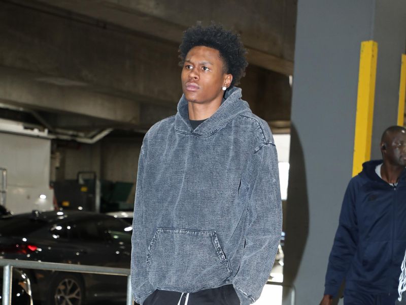 PORTLAND, OR - FEBRUARY 23: Peyton Watson #8 of the Denver Nuggets arrives to the arena before the game against the Portland Trail Blazers on February 23, 2024 at the Moda Center Arena in Portland, Oregon. NOTE TO USER: User expressly acknowledges and agrees that, by downloading and or using this photograph, user is consenting to the terms and conditions of the Getty Images License Agreement. Mandatory Copyright Notice: Copyright 2024 NBAE (Photo by Cameron Browne/NBAE via Getty Images)