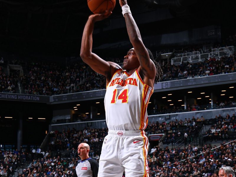 BROOKLYN, NY - MARCH 16: Terance Mann #14 of the Atlanta Hawks shoots a three point basket during the game against the Brooklyn Nets on March 16, 2025 at Barclays Center in Brooklyn, New York. NOTE TO USER: User expressly acknowledges and agrees that, by downloading and or using this Photograph, user is consenting to the terms and conditions of the Getty Images License Agreement. Mandatory Copyright Notice: Copyright 2025 NBAE (Photo by David L. Nemec/NBAE via Getty Images)