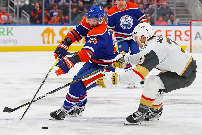 Apr 10, 2024; Edmonton, Alberta, CAN; Edmonton Oilers forward Adam Henrique (19) battles for a loose puck with Vegas Golden Knights defensemen Brayden McNabb (3) during the first period at Rogers Place. Mandatory Credit: Perry Nelson-USA TODAY Sports