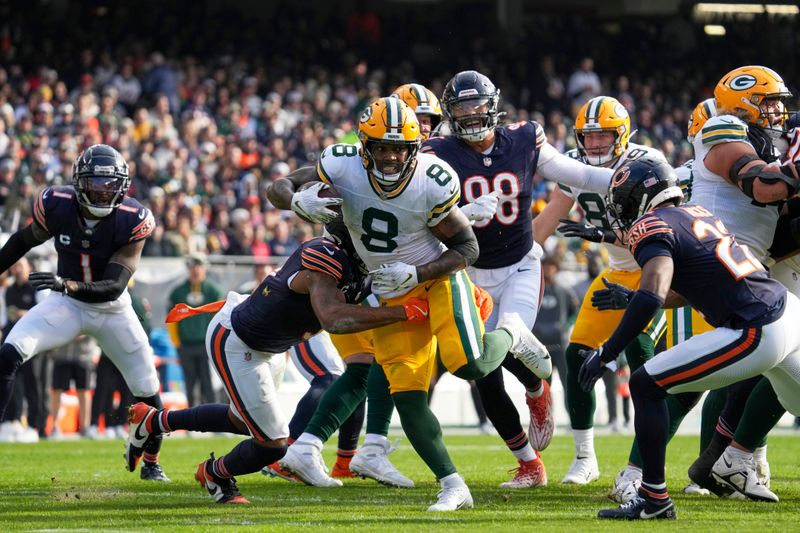 Green Bay Packers' Josh Jacobs runs during the first half of an NFL football game against the Chicago Bears Sunday, Nov. 17, 2024, in Chicago. (AP Photo/Nam Y. Huh)