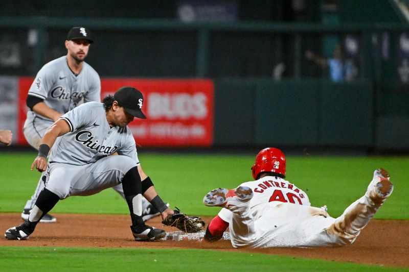 May 3, 2024; St. Louis, Missouri, USA;  St. Louis Cardinals catcher Willson Contreras (40) steals second base as Chicago White Sox second baseman Nicky Lopez (8) fields the throw during the seventh inning at Busch Stadium. Mandatory Credit: Jeff Curry-USA TODAY Sports