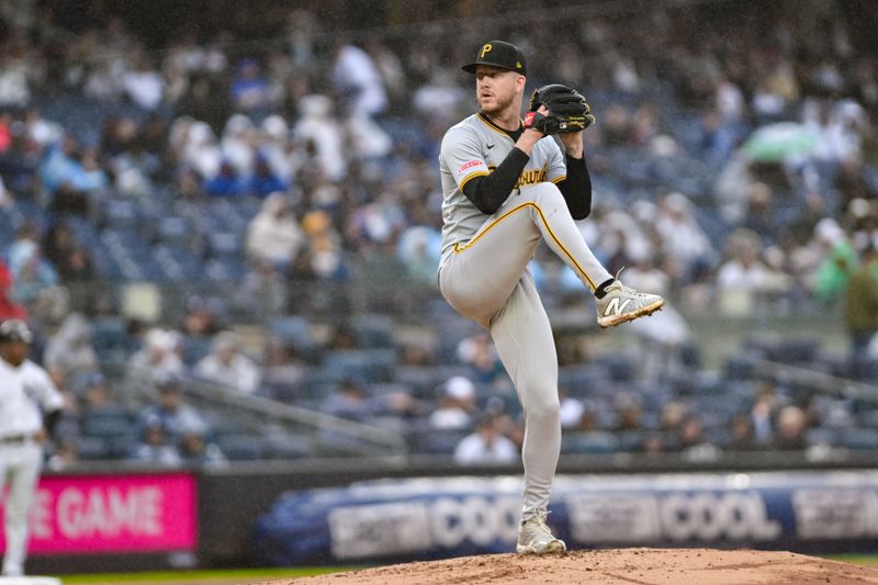 Sep 29, 2024; Bronx, New York, USA; Pittsburgh Pirates pitcher Bailey Falter (26) pitches against the New York Yankees during the first inning at Yankee Stadium. Mandatory Credit: John Jones-Imagn Images