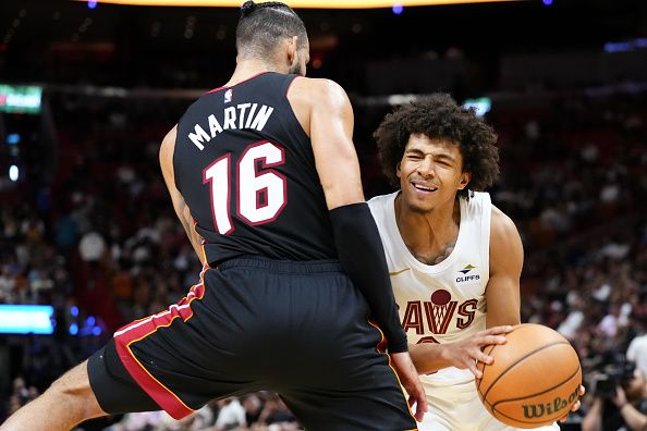 MIAMI, FLORIDA - DECEMBER 08: Craig Porter #9 of the Cleveland Cavaliers attempts to dribbles past Caleb Martin #16 of the Miami Heat during the second quarter at Kaseya Center on December 08, 2023 in Miami, Florida. NOTE TO USER: User expressly acknowledges and agrees that, by downloading and or using this photograph, User is consenting to the terms and condtions of the Getty Images License Agreement.  (Photo by Rich Storry/Getty Images)