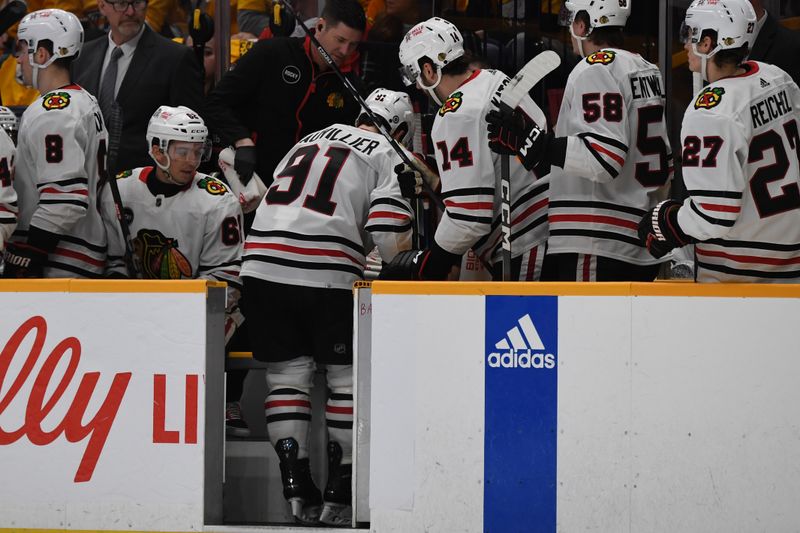 Jan 2, 2024; Nashville, Tennessee, USA; Chicago Blackhawks left winger Anthony Beauvillier (91) leaves the ice after an injury during the second period against the Nashville Predators at Bridgestone Arena. Mandatory Credit: Christopher Hanewinckel-USA TODAY Sports