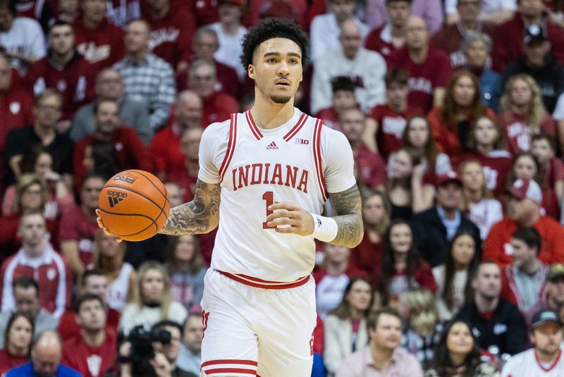 Jan 28, 2023; Bloomington, Indiana, USA; Indiana Hoosiers guard Jalen Hood-Schifino (1) dribbles the ball in the first half against the Ohio State Buckeyes at Simon Skjodt Assembly Hall. Mandatory Credit: Trevor Ruszkowski-USA TODAY Sports