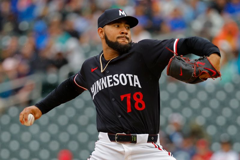 Jun 20, 2024; Minneapolis, Minnesota, USA; Minnesota Twins starting pitcher Simeon Woods Richardson throws to the Tampa Bay Rays in the second inning at Target Field. Mandatory Credit: Bruce Kluckhohn-USA TODAY Sports