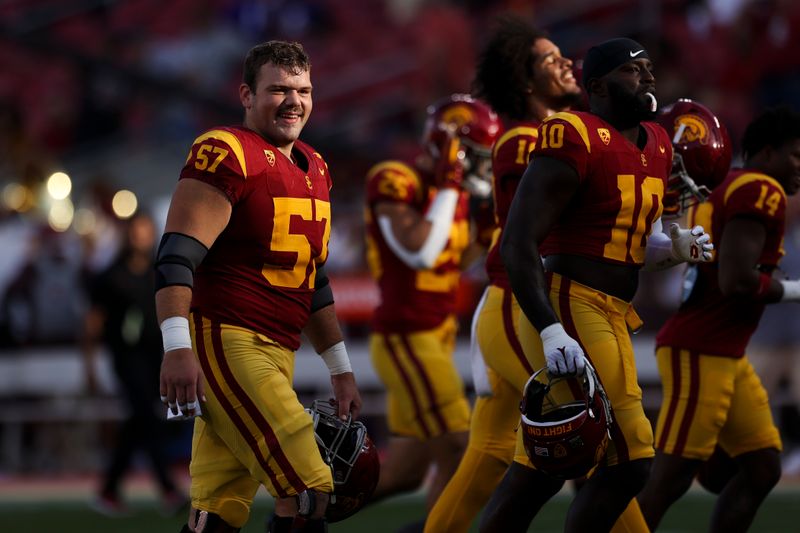 Nov 4, 2023; Los Angeles, California, USA; USC Trojans offensive lineman Justin Dedich (57) reacts before a game against the Washington Huskies at United Airlines Field at Los Angeles Memorial Coliseum. Mandatory Credit: Jessica Alcheh-USA TODAY Sports