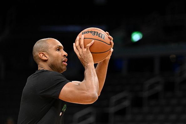 BOSTON, MASSACHUSETTS - DECEMBER 28: Al Horford #42 of the Boston Celtics takes a shot during warmups before a game against the Detroit Pistons at the TD Garden on December 28, 2023 in Boston, Massachusetts. NOTE TO USER: User expressly acknowledges and agrees that, by downloading and or using this photograph, User is consenting to the terms and conditions of the Getty Images License Agreement. (Photo by Brian Fluharty/Getty Images)