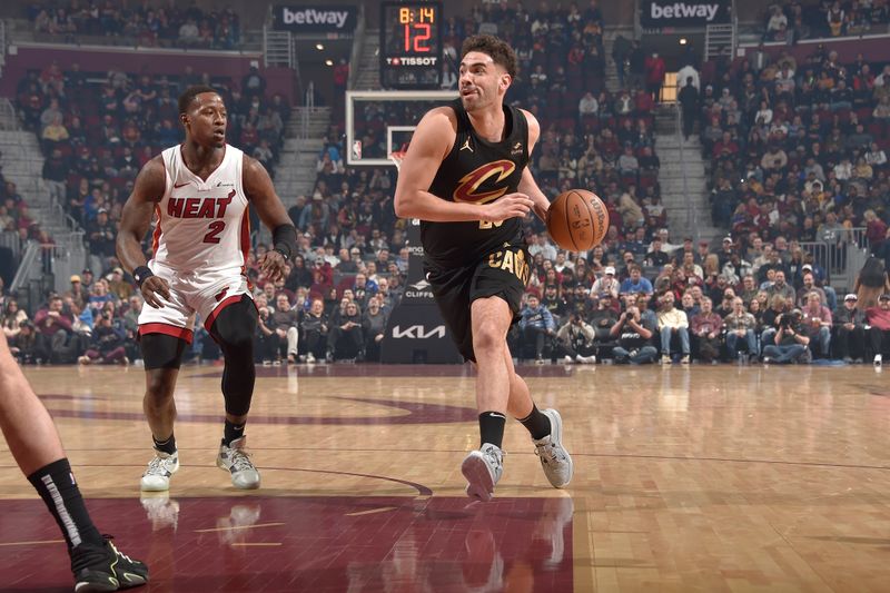 CLEVELAND, OH - MARCH 20: Georges Niang #20 of the Cleveland Cavaliers drives to the basket during the game against the Miami Heat on March 20, 2024 at Rocket Mortgage FieldHouse in Cleveland, Ohio. NOTE TO USER: User expressly acknowledges and agrees that, by downloading and/or using this Photograph, user is consenting to the terms and conditions of the Getty Images License Agreement. Mandatory Copyright Notice: Copyright 2024 NBAE (Photo by David Liam Kyle/NBAE via Getty Images)