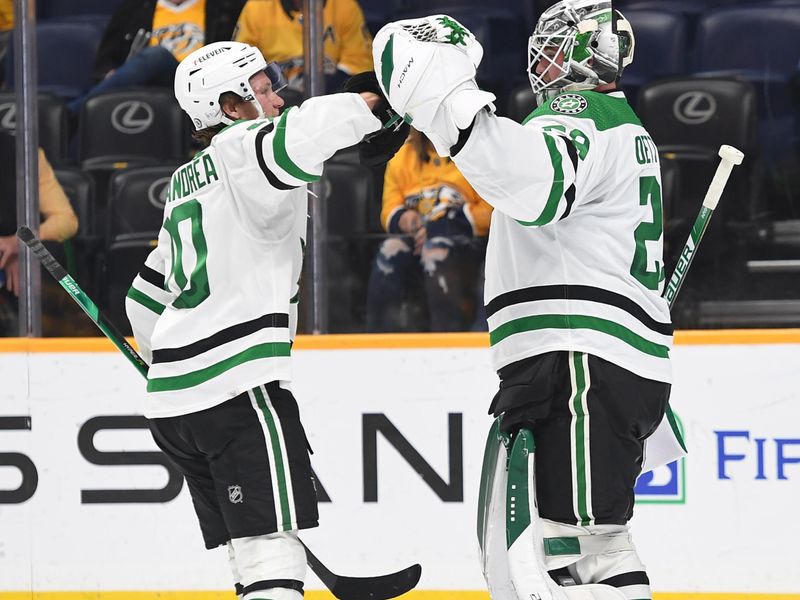 Oct 13, 2022; Nashville, Tennessee, USA; Dallas Stars center Ty Dellandrea (10) and goaltender Jake Oettinger (29) celebrate after a win against the Nashville Predators at Bridgestone Arena. Mandatory Credit: Christopher Hanewinckel-USA TODAY Sports