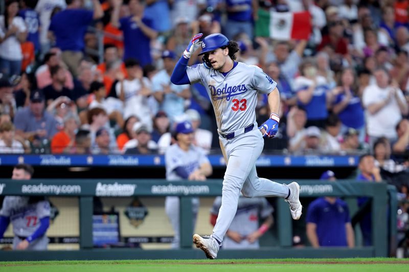 Jul 28, 2024; Houston, Texas, USA; Los Angeles Dodgers outfielder James Outman (33) runs towards home plate after hitting hits a home run to left field against the Houston Astros during the fifth inning at Minute Maid Park. Mandatory Credit: Erik Williams-USA TODAY Sports