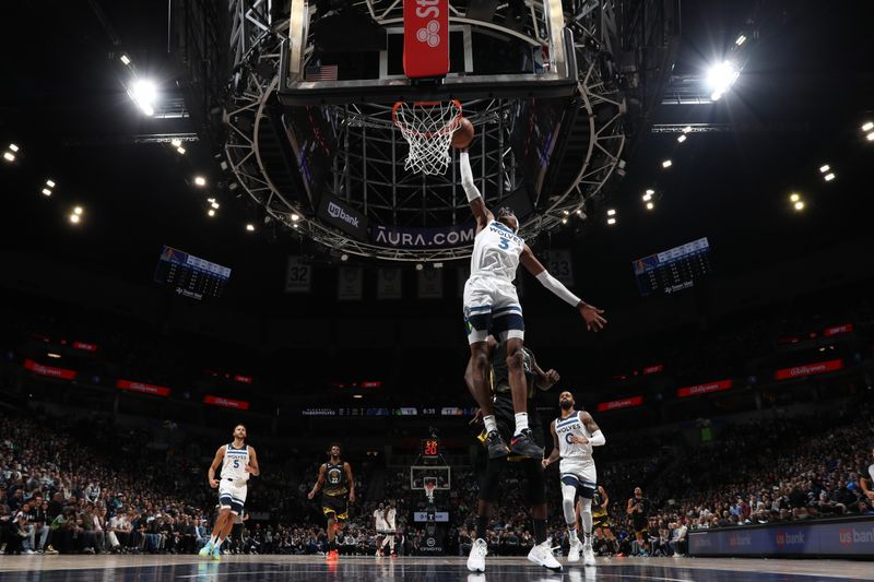 MINNEAPOLIS, MN -  FEBRUARY 1: Jaden McDaniels #3 of the Minnesota Timberwolves drives to the basket during the game against the Golden State Warriors on February 1, 2023 at Target Center in Minneapolis, Minnesota. NOTE TO USER: User expressly acknowledges and agrees that, by downloading and or using this Photograph, user is consenting to the terms and conditions of the Getty Images License Agreement. Mandatory Copyright Notice: Copyright 2023 NBAE (Photo by Jordan Johnson/NBAE via Getty Images)