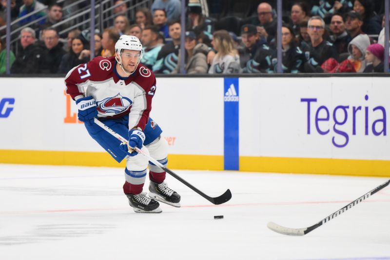 Nov 13, 2023; Seattle, Washington, USA; Colorado Avalanche left wing Jonathan Drouin (27) plays the puck against the Seattle Kraken during the first period at Climate Pledge Arena. Mandatory Credit: Steven Bisig-USA TODAY Sports