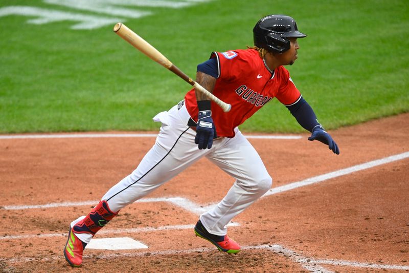 May 12, 2025; Cleveland, Ohio, USA; Cleveland Guardians third baseman Jose Ramirez (11) singles in the fourth inning against the Milwaukee Brewers at Progressive Field. Mandatory Credit: David Richard-Imagn Images