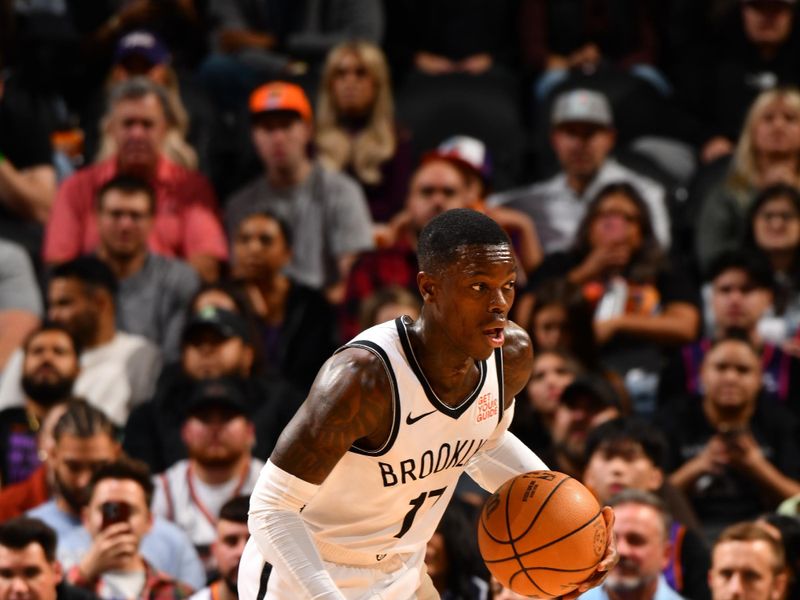 PHOENIX, AZ - NOVEMBER 27: Dennis Schroder #17 of the Brooklyn Nets dribbles the ball during the game against the Phoenix Suns on November 27, 2024 at Footprint Center in Phoenix, Arizona. NOTE TO USER: User expressly acknowledges and agrees that, by downloading and or using this photograph, user is consenting to the terms and conditions of the Getty Images License Agreement. Mandatory Copyright Notice: Copyright 2024 NBAE (Photo by Barry Gossage/NBAE via Getty Images)