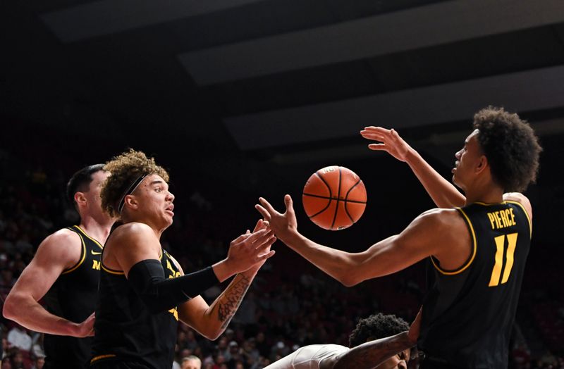 Jan 16, 2024; Tuscaloosa, Alabama, USA; A blocked shot falls into the hands of Missouri forward Noah Carter (35) and Missouri forward Trent Pierce (11) in the game against Alabama at Coleman Coliseum. Mandatory Credit: Gary Cosby Jr.-USA TODAY Sports