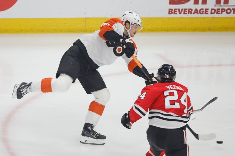 Feb 21, 2024; Chicago, Illinois, USA; Philadelphia Flyers left wing Joel Farabee (86) shoots against the Chicago Blackhawks during the first period at United Center. Mandatory Credit: Kamil Krzaczynski-USA TODAY Sports