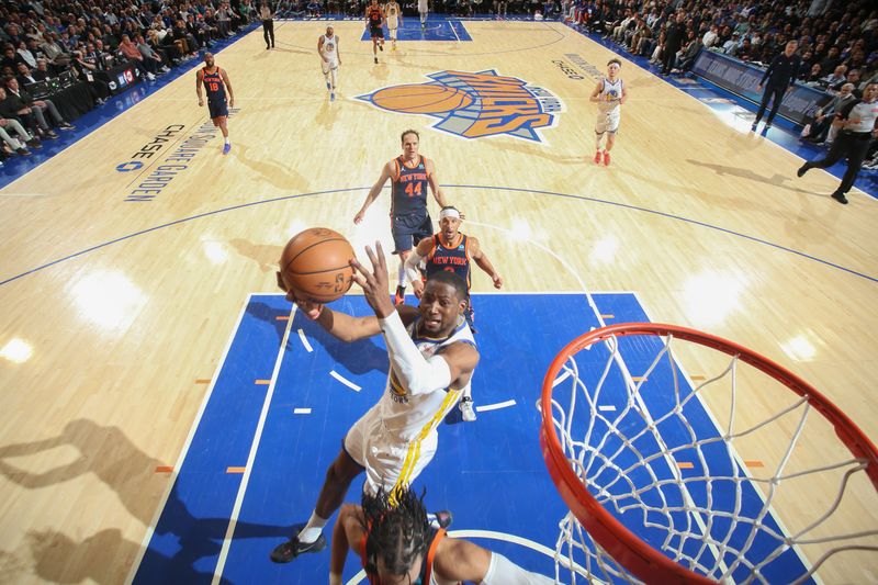 NEW YORK, NY - FEBRUARY 29: Jonathan Kuminga #00 of the Golden State Warriors drives to the basket during the game against the New York Knicks on January 29, 2024 at Madison Square Garden in New York City, New York.  NOTE TO USER: User expressly acknowledges and agrees that, by downloading and or using this photograph, User is consenting to the terms and conditions of the Getty Images License Agreement. Mandatory Copyright Notice: Copyright 2024 NBAE  (Photo by Nathaniel S. Butler/NBAE via Getty Images)